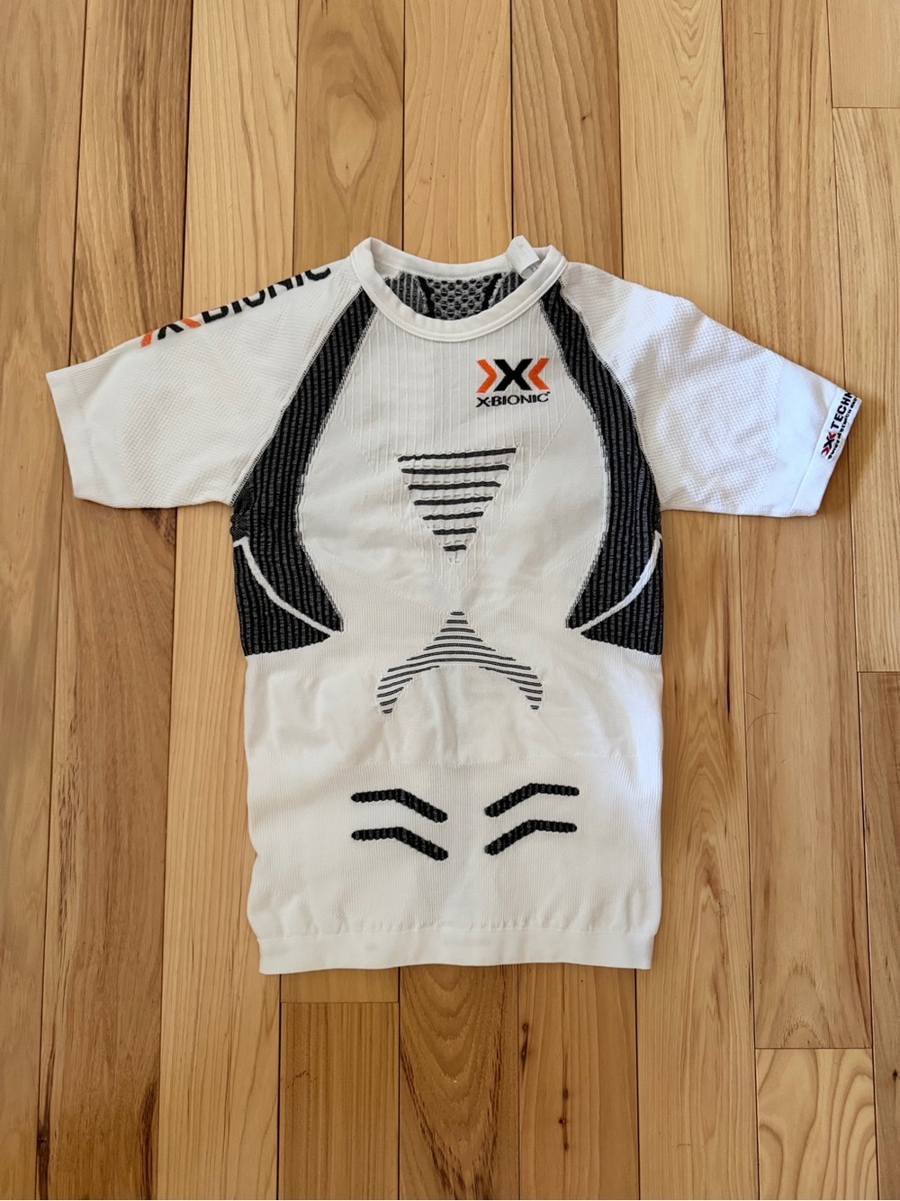 X-Bionic the trick White & Black Performance Short Sleeve Top. NWOT